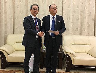 President Ni and Prof. Abe