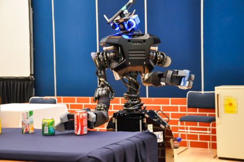 Intelligent robots as models for studying human communication